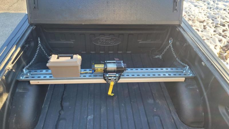 Winch on removable rail