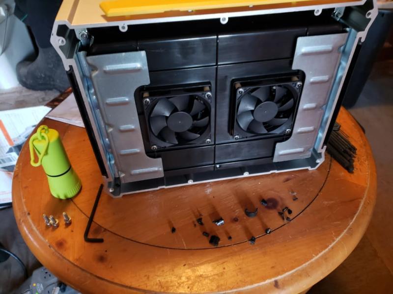 lose screw and broken plastic pieces inside unit