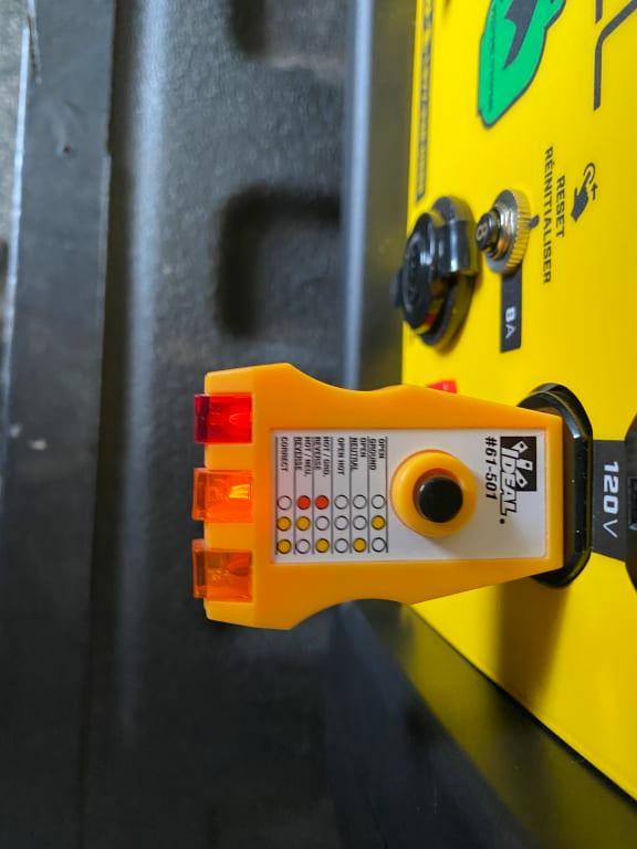 circuit tester plugged into duplex receptacle of inverter/generator