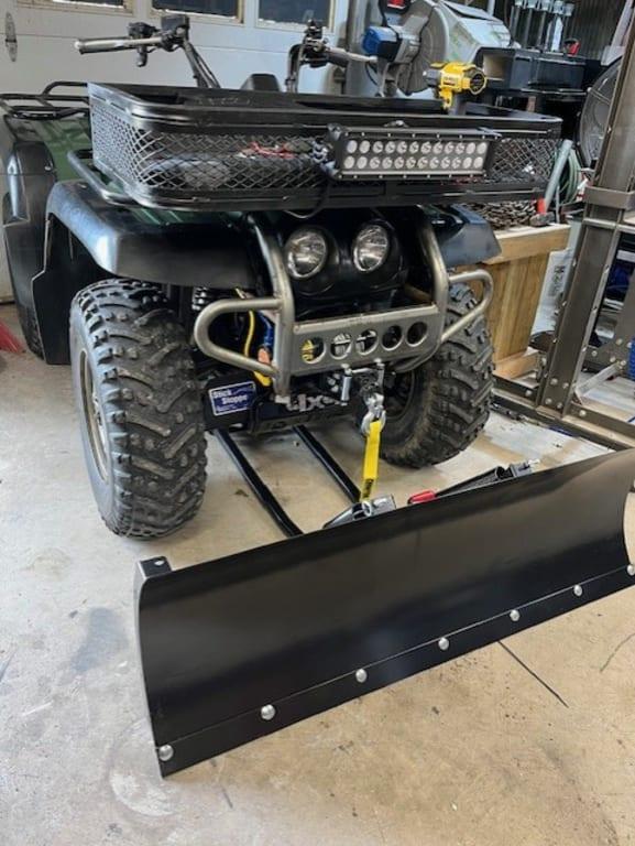 Champion winch with snow plow.