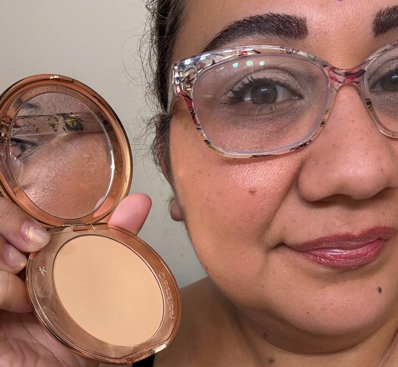 Customer photo for "Smooths and controls shine without making my skin look cakey."
