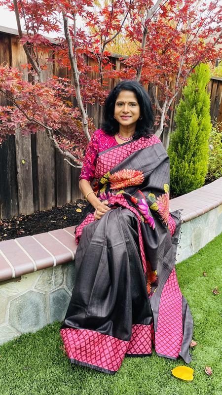 In traditional Indian attire, Saree.