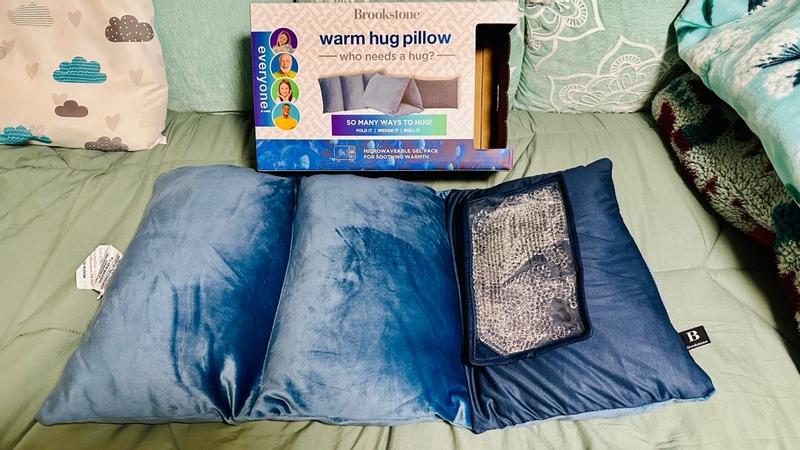 Brookstone HUG ZZZ Warming Pillow decoratd
