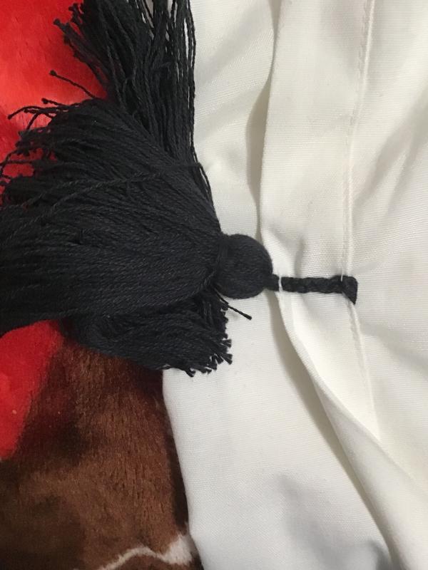Tassels looks like an afterthought