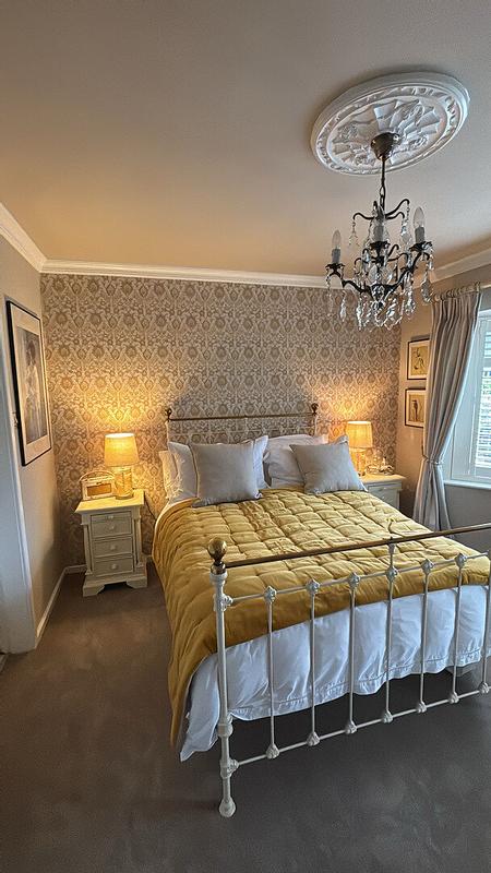 Customer photo for "Jaipur turmeric throw is gorgeous"