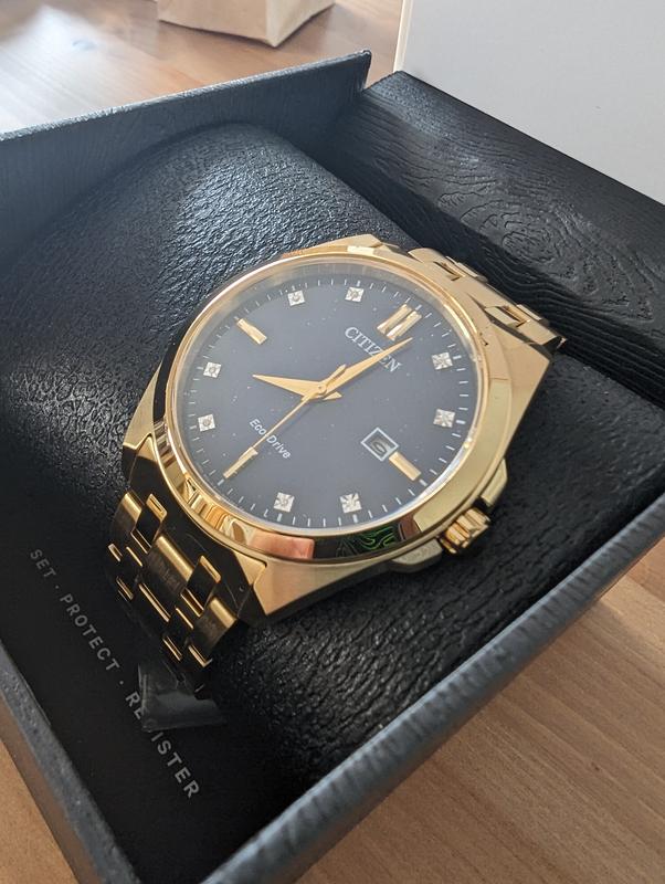 Citizen gold watch with black clearance face