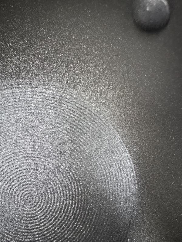 Several scratches on the bottom of the flying pan