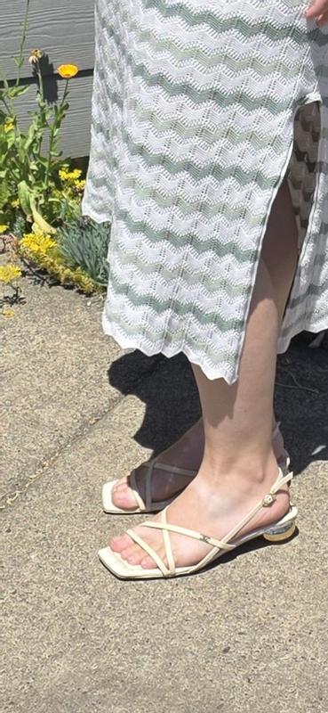 Customer photo for "Cute heels, a little tight on top of foot"