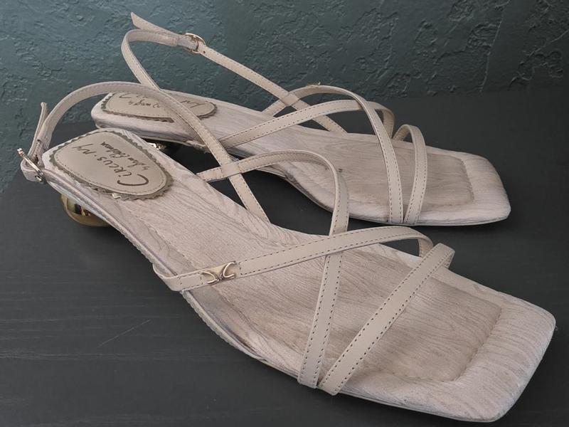 Customer photo for "Cute heels, a little tight on top of foot"
