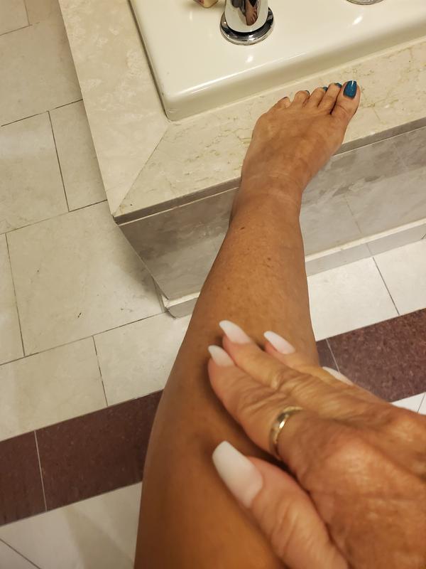 Applying this Silky oil on my leg