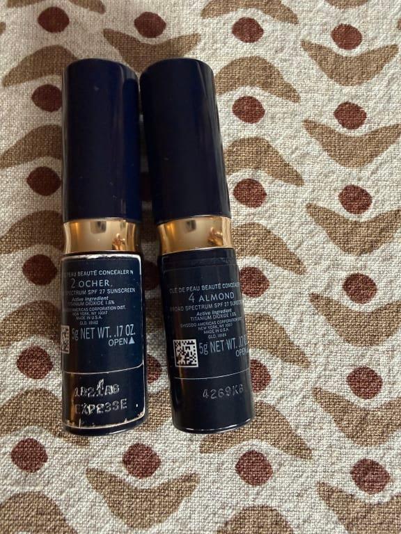 Older ocher on left, new almond on right