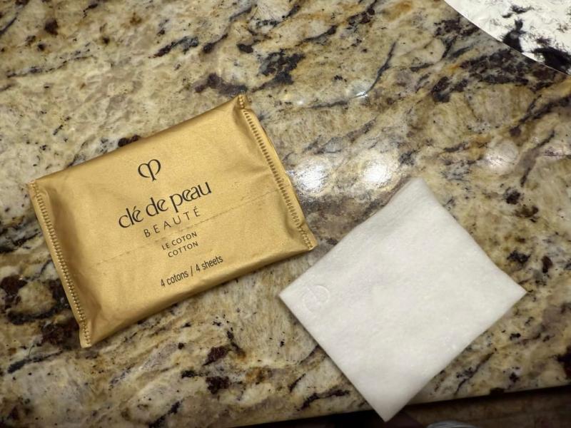 "Received these Clé de Peau cotton facial pads to try - they held my essence perfectly and left my skin hydrated and glowy!"