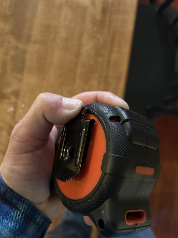 Tab to open belt clip