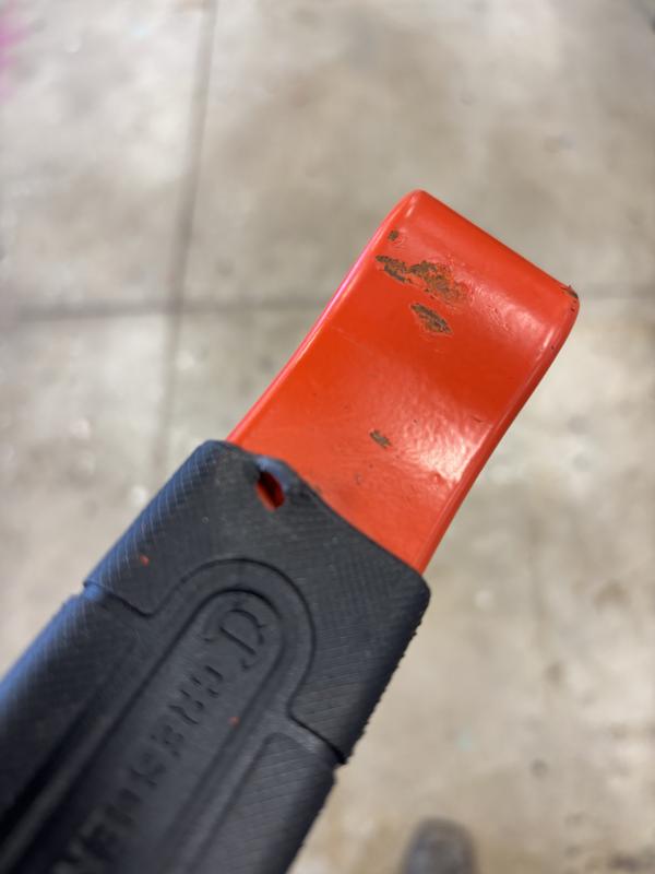 Torn hole in grip from one hit.