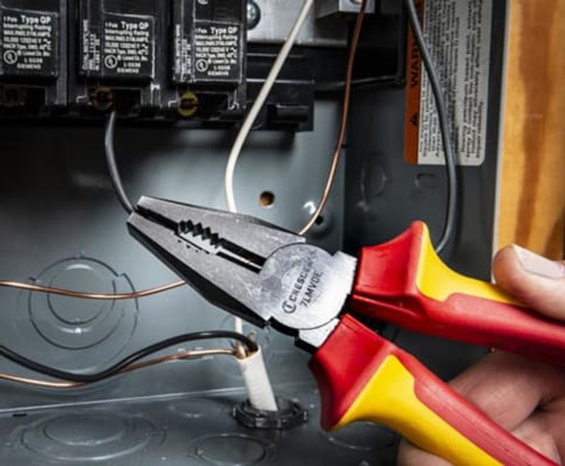 Stripping wires with ease using the 6in Crescent Tools insulated pliers
