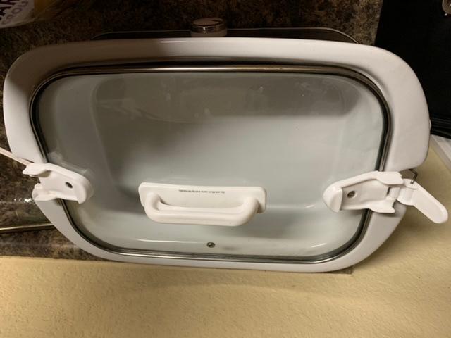 See the white clasp on left side is gone