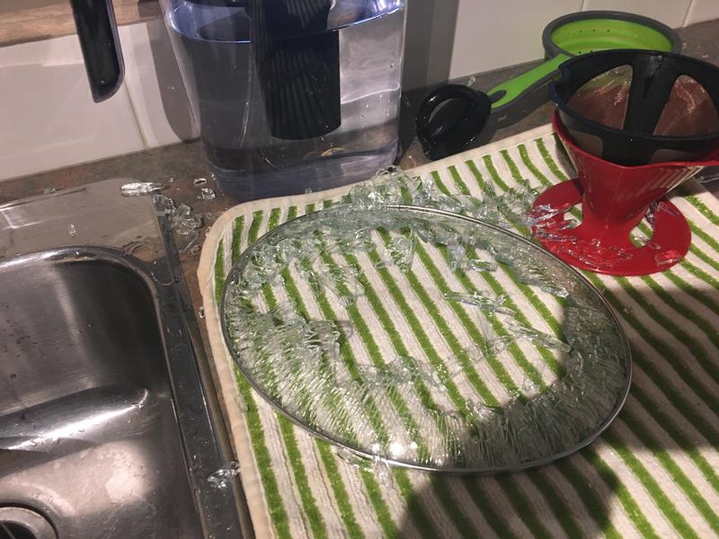 Exploded Crockpot lid showing where handle landed