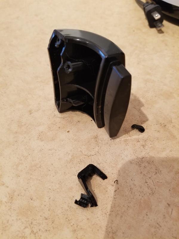 The cover holder became brittle from heat.