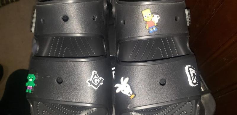 shoes with charms attached.