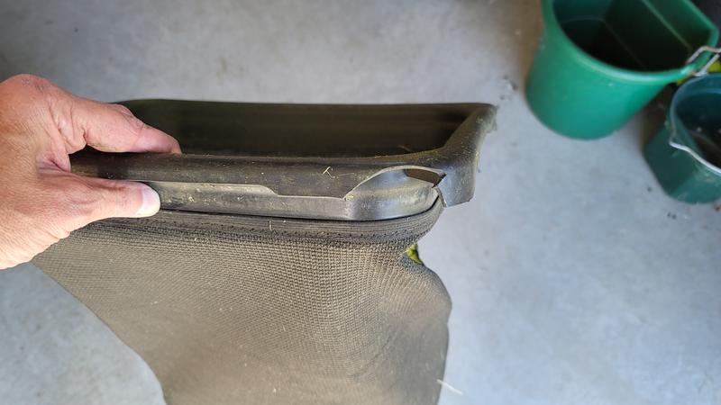 Broken Plastic around cloth bagger