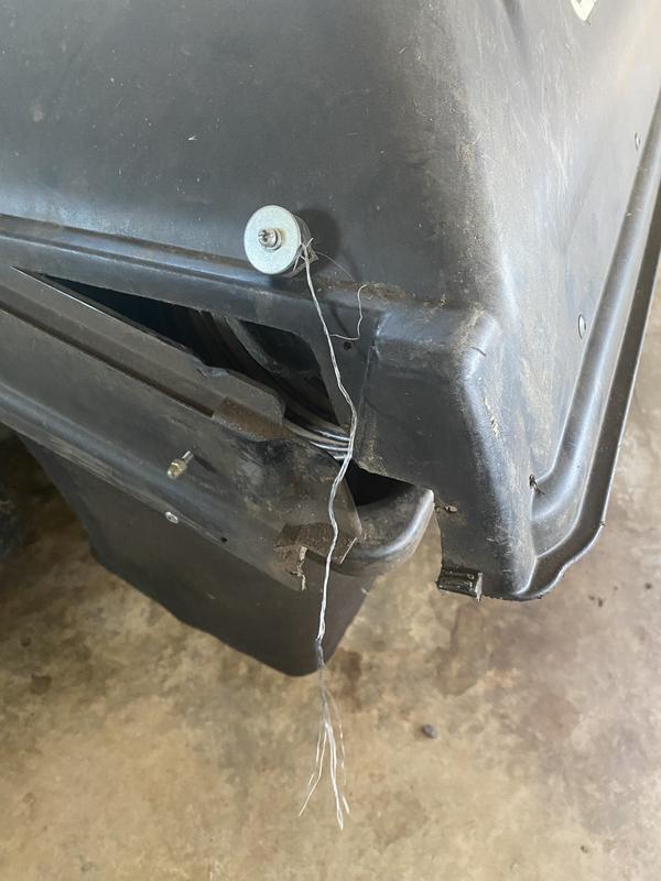 Broken tabs so I had to invent a way to hold it down, otherwise grass goes everywhere