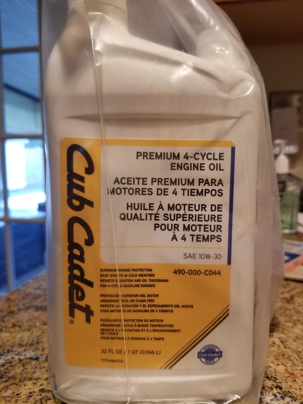 Premium 4-Cycle  SAE 10W-30 Engine Oil 32oz plastic bottles.