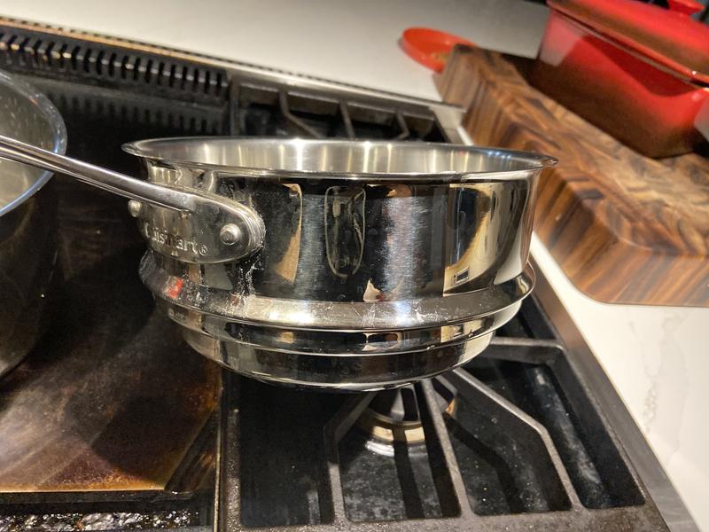 The side of the double boiler; you can kind of see the curve of the bottom.