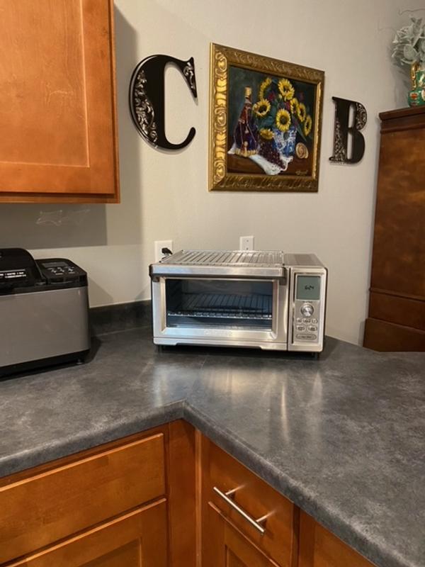 Happily living on my eating counter, instead of in the corner. (too small an area)