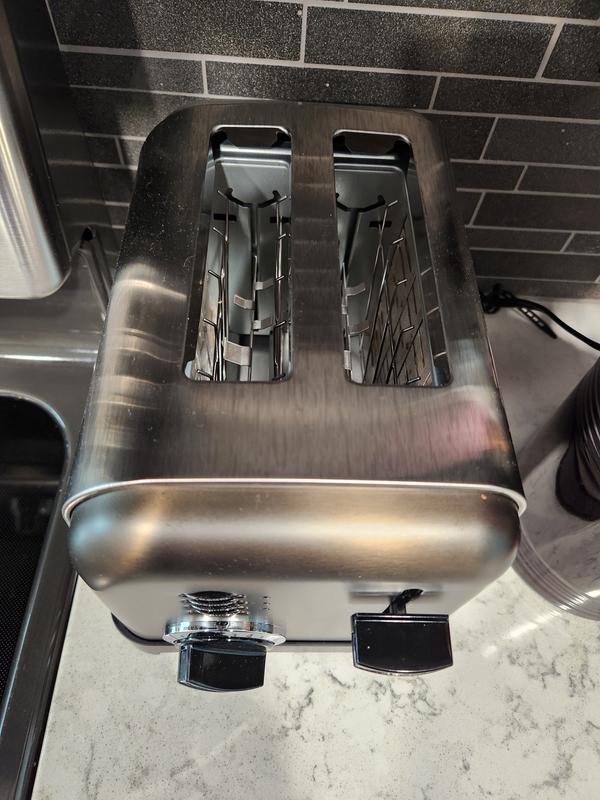 The wide slots easily accommodate bagels and wide toast.