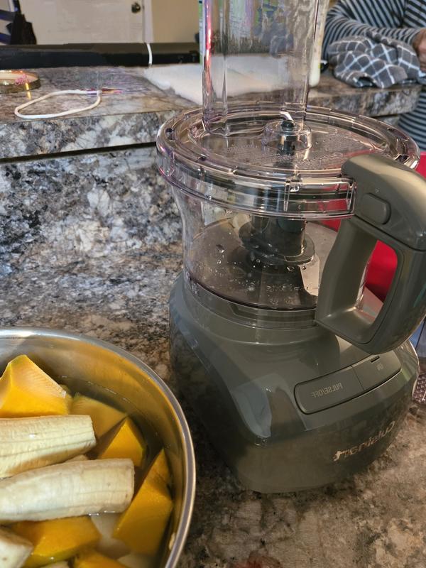Preparing the veggies to shred,
