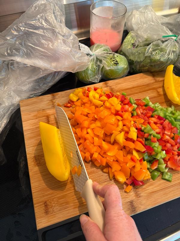 Knife cutting food