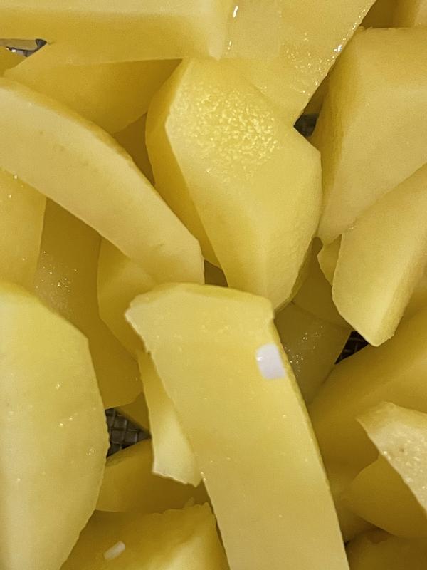 See the little white plastic on the potatoes?