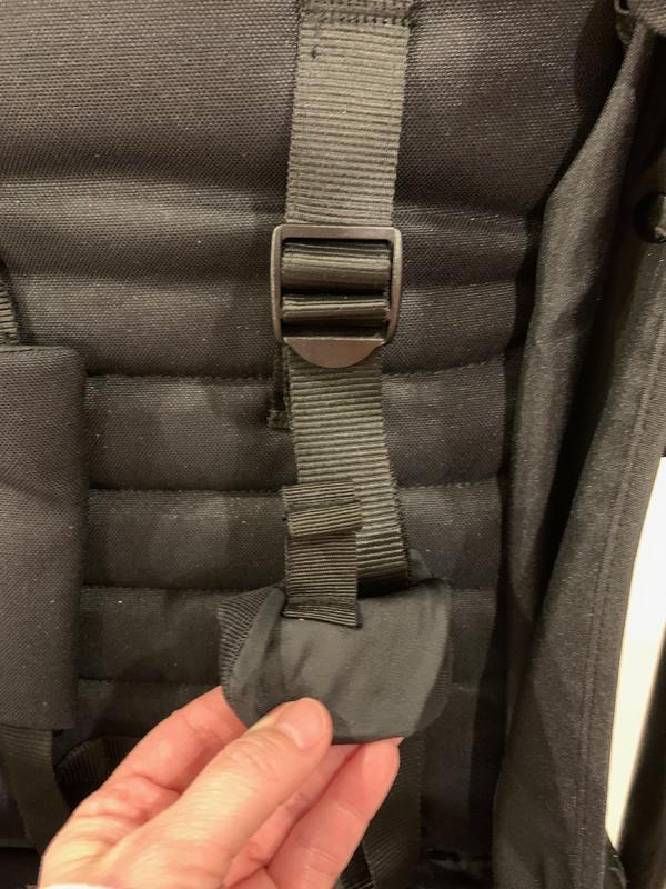 I pulled it out to move it more (which wasn't easy!). But then it was really difficult to get it back in. Definitely can't do this with the baby in the stroller.