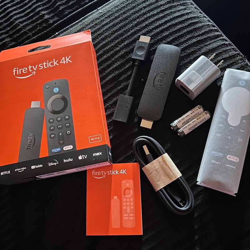 Amazon Fire TV Stick 4K streaming device, includes support
