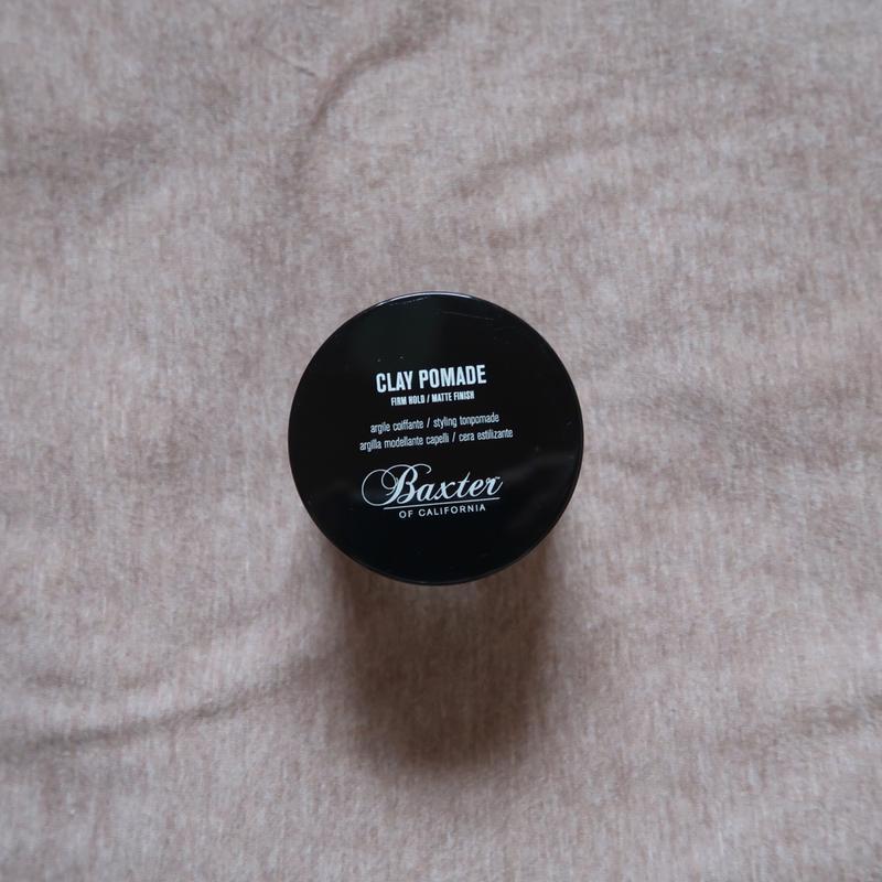 Clay Pomade on a bed