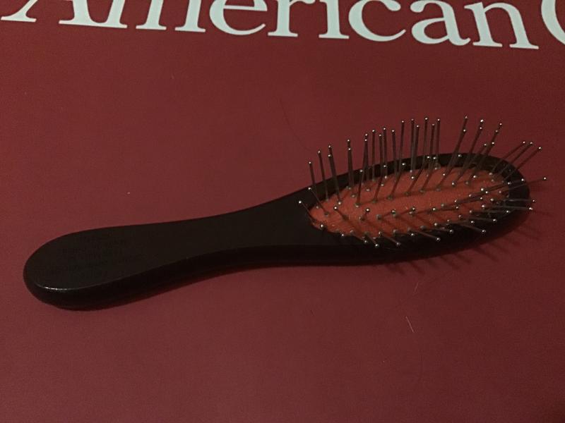 American girl deals brush