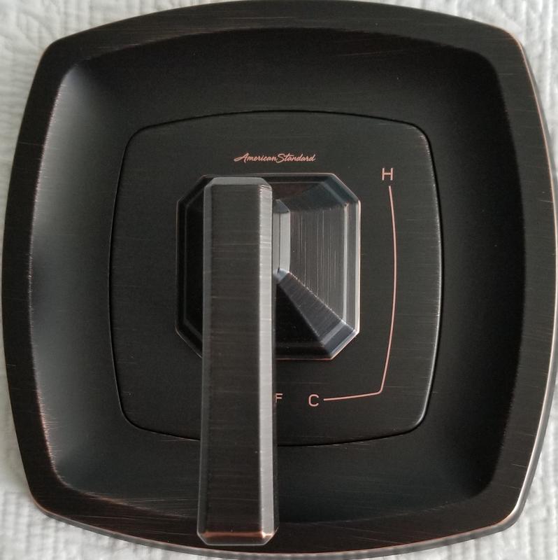 Dark bronze color inside the "BRUSHED NICKEL" box