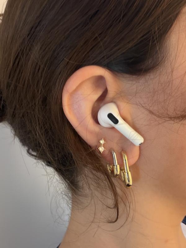 From bottom to top: brynley hoops large > brynley two tone > stud from Val white set