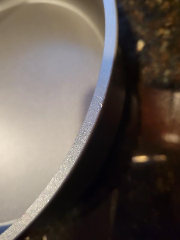 Knick on side of pan
