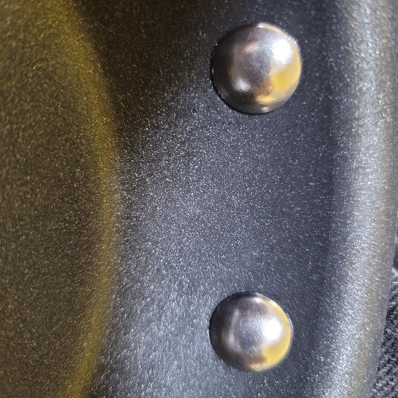 Please excuse the scrambled egg stuck under the rivet!