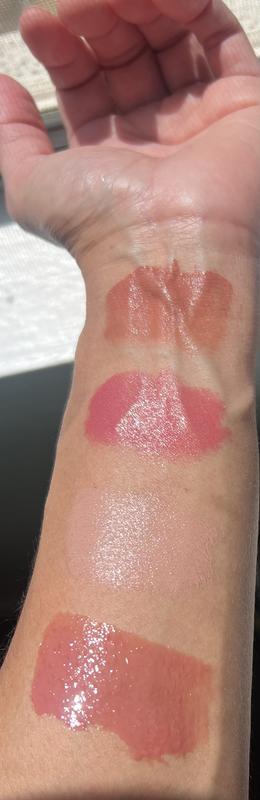 Top three are lipsticks (soft brown, rose dream, haze) and the bottom one is the gloss in Sunbaked