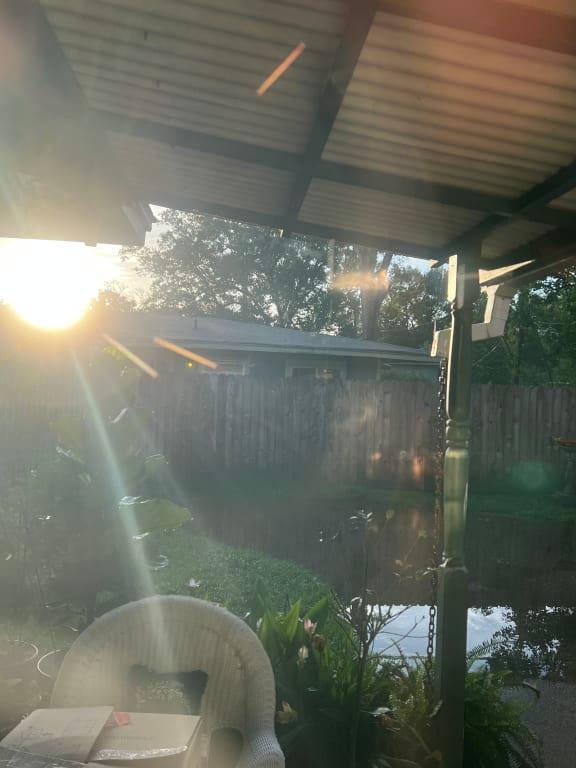 AcuRite indicated cloudy with showers; this is the actual weather outside, not a cloud in the sky!