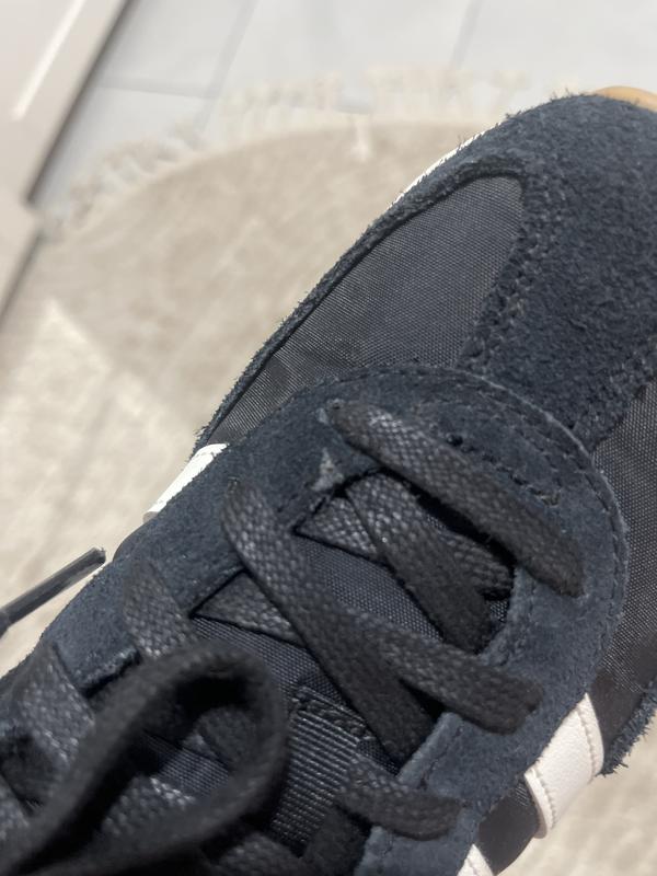 Right shoe has this glue mark