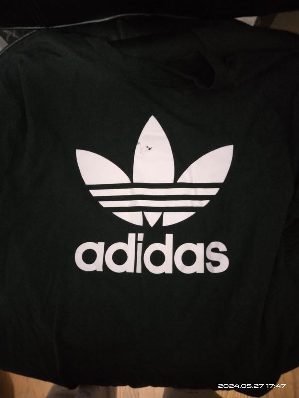 Customer photo for "logo paint is gone in one wash"