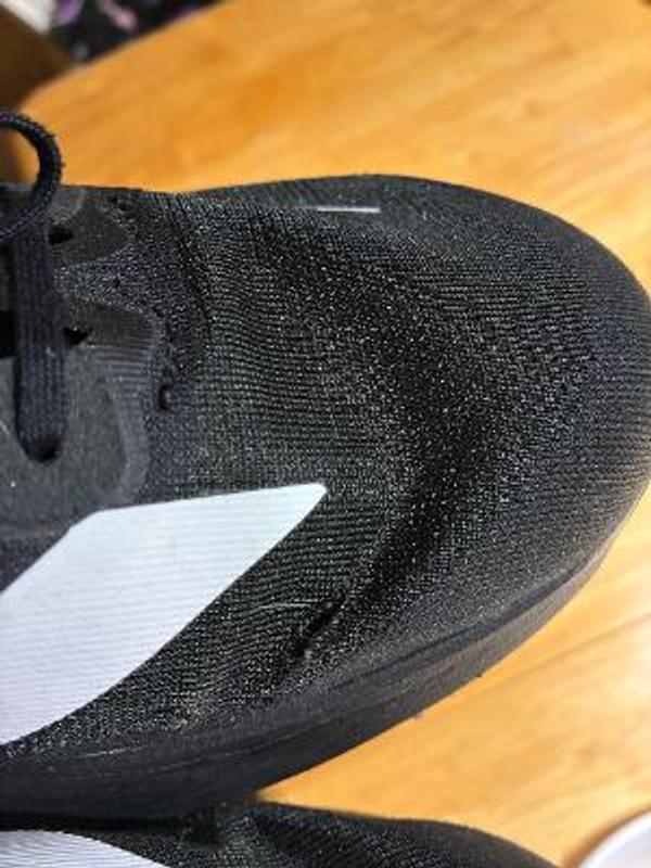 Customer photo for "Great shoes but material doesn't hold up"