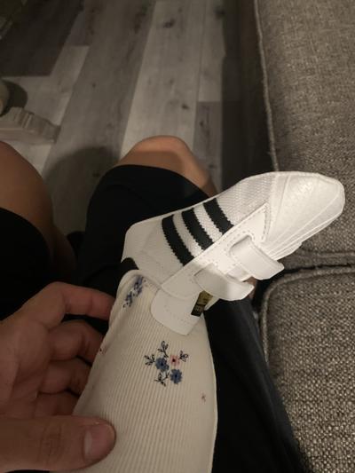 Customer photo for "Bought these for my baby girl and they look amazing with her new track suit!"