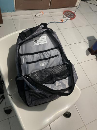 Customer photo for "Well made, when you see it the first time will never imagine it can handle storage so good, can keep big bottles, laptops up to 17”."