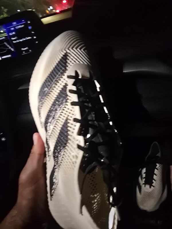Customer photo for "Not a comfortable shoe. As it hurt my left foot."