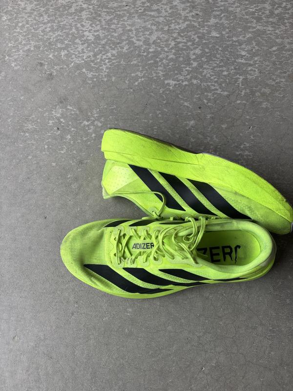 Customer photo for "Enjoy every run when wearing these shoes sized 1/2"