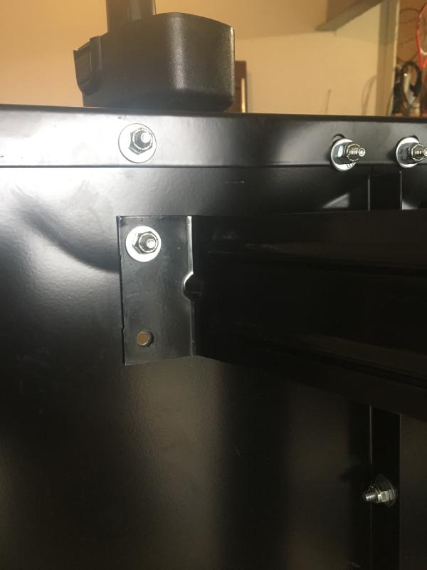 The new hole I drilled is on the bottom